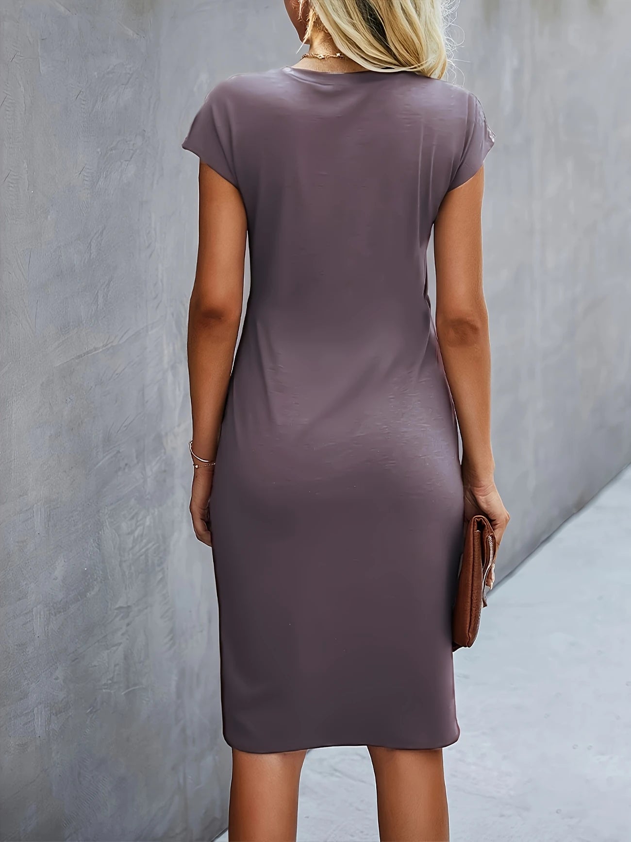 Dames Elegante getailleerde zomerjurk met twist | Midi