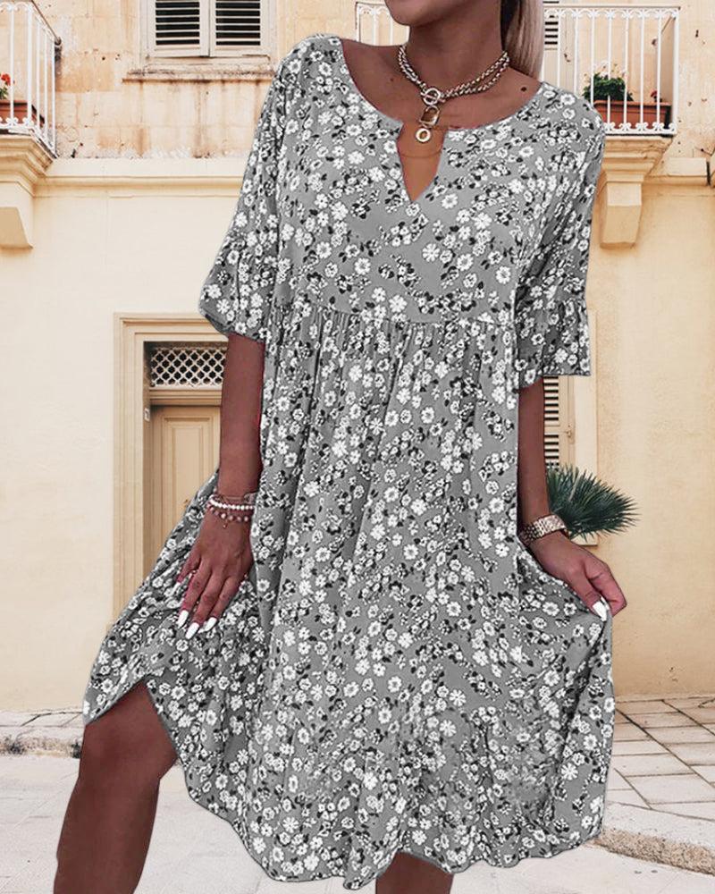 Dames Luchtige a-lijn zomerjurk met bloemen | Midi
