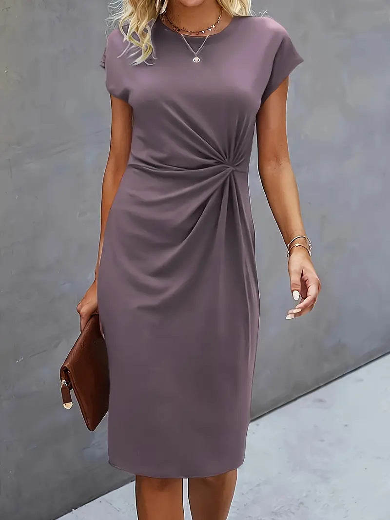 Dames Elegante getailleerde zomerjurk met twist | Midi